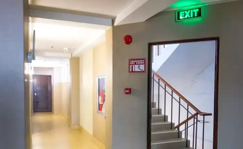 stairwell with fire exit sign